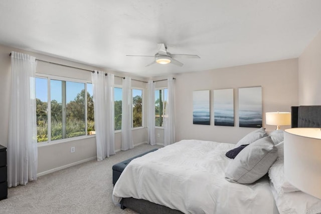 11171 Alejo Pl, San Diego, CA 92124 - bedroom with multiple windows, baseboards, carpet floors, and a ceiling fan