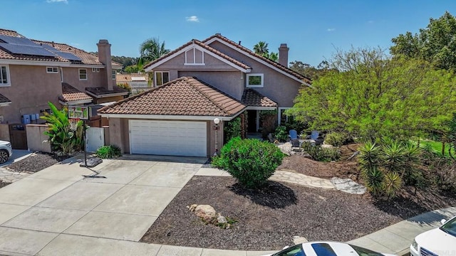 11171 Alejo Pl, San Diego, CA 92124 - view of front of home with an attached garage, stucco siding, concrete driveway, and a tile roof