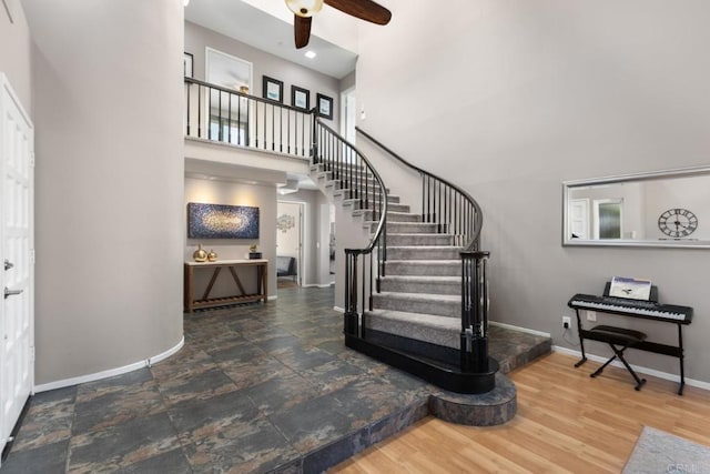 11171 Alejo Pl, San Diego, CA 92124 - entryway with baseboards, a towering ceiling, a ceiling fan, and stairs