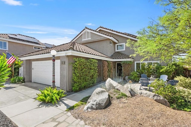 11171 Alejo Pl, San Diego, CA 92124 - traditional-style home with stucco siding, an attached garage, concrete driveway, and a tiled roof