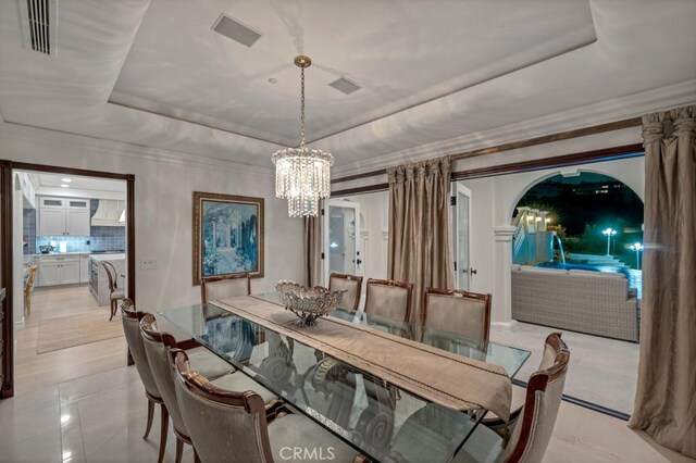 8 Saint Tropez, Laguna Niguel, CA 92677 - dining area with a tray ceiling and a chandelier