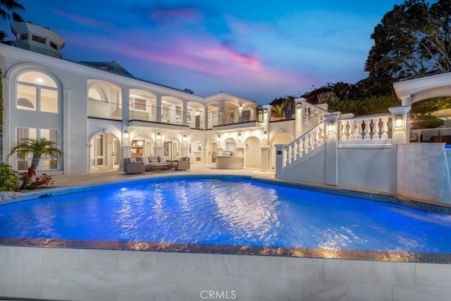 8 Saint Tropez, Laguna Niguel, CA 92677 - pool at dusk with an outdoor hangout area, an outdoor pool, and a patio