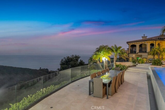 8 Saint Tropez, Laguna Niguel, CA 92677 - patio terrace at dusk featuring a patio and outdoor dining area