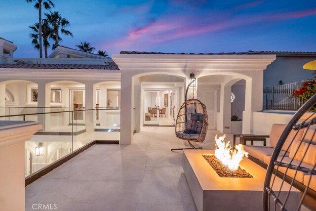 8 Saint Tropez, Laguna Niguel, CA 92677 - view of patio / terrace with a fire pit and french doors