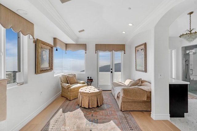 8 Saint Tropez, Laguna Niguel, CA 92677 - sitting room with ornamental molding, light wood-type flooring, arched walkways, baseboards, and recessed lighting