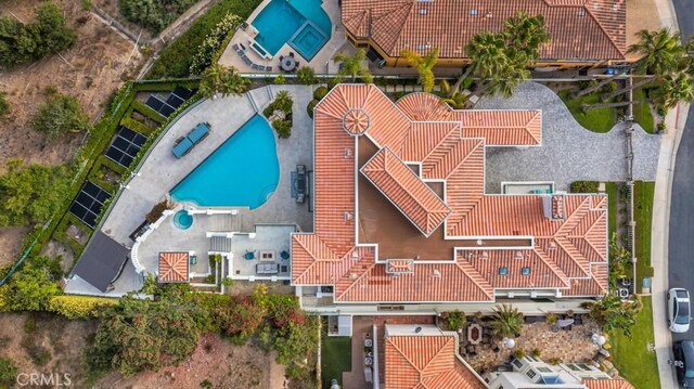 8 Saint Tropez, Laguna Niguel, CA 92677 - aerial view of property and surrounding area featuring a pool area