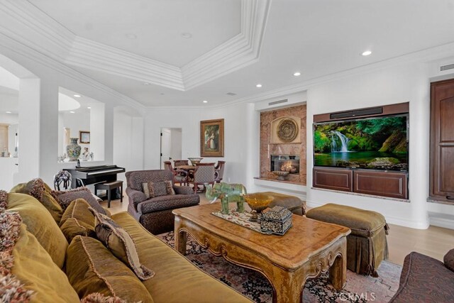 8 Saint Tropez, Laguna Niguel, CA 92677 - living area with ornamental molding, a tray ceiling, recessed lighting, and wood finished floors