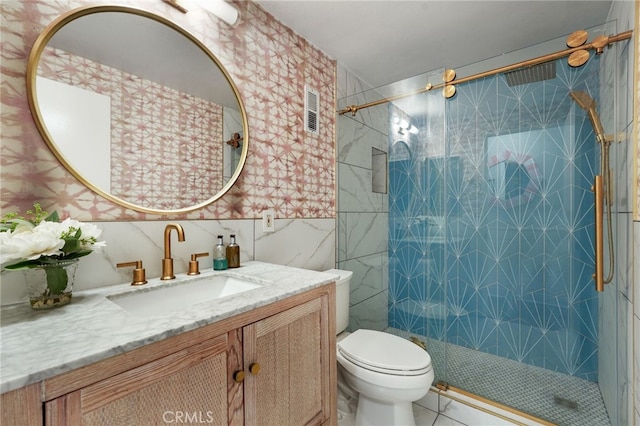 700 Esplanade Unit 9, Redondo Beach, CA 90277 - full bath with tile walls, vanity, a shower stall, toilet, and tile patterned flooring