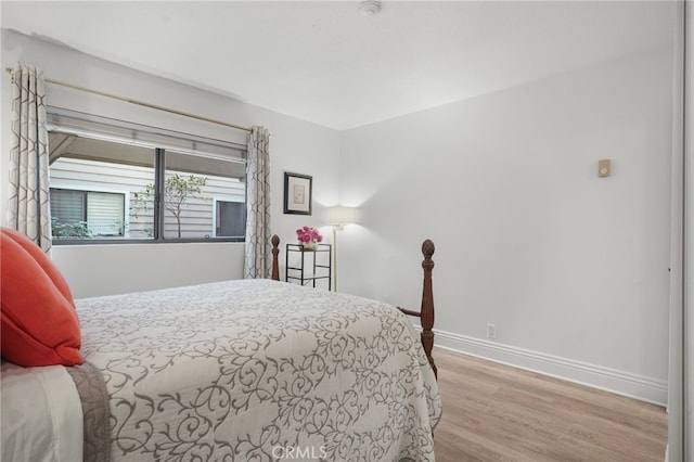 700 Esplanade Unit 9, Redondo Beach, CA 90277 - bedroom with wood finished floors and baseboards