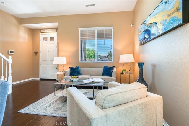 15190 Fox Ridge Dr, Fontana, CA 92336 - living room with wood finished floors, baseboards, and stairs