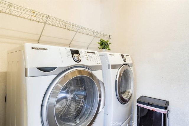 15190 Fox Ridge Dr, Fontana, CA 92336 - washroom with washing machine and dryer
