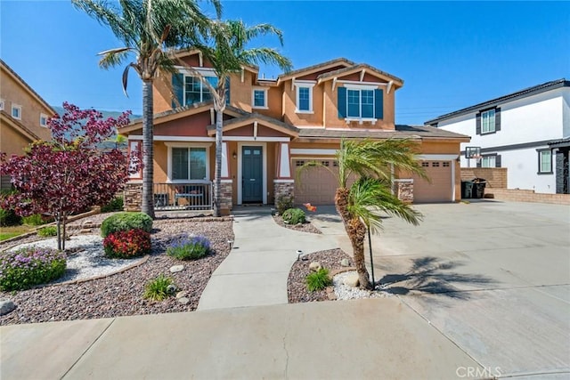 15190 Fox Ridge Dr, Fontana, CA 92336 - craftsman inspired home featuring stucco siding, a porch, concrete driveway, and stone siding