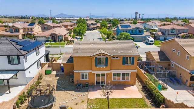 15190 Fox Ridge Dr, Fontana, CA 92336 - aerial view of residential area featuring a mountainous background