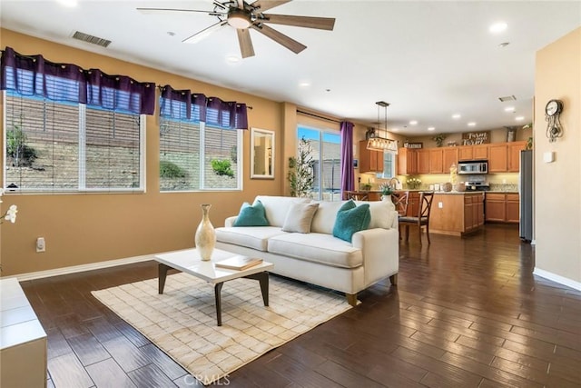 15190 Fox Ridge Dr, Fontana, CA 92336 - living area with a ceiling fan, baseboards, recessed lighting, and dark wood-type flooring