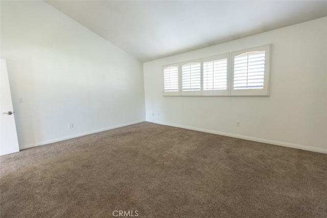 1903 W W Wind, Santa Ana, CA 92704 - unfurnished room with vaulted ceiling, carpet flooring, and baseboards