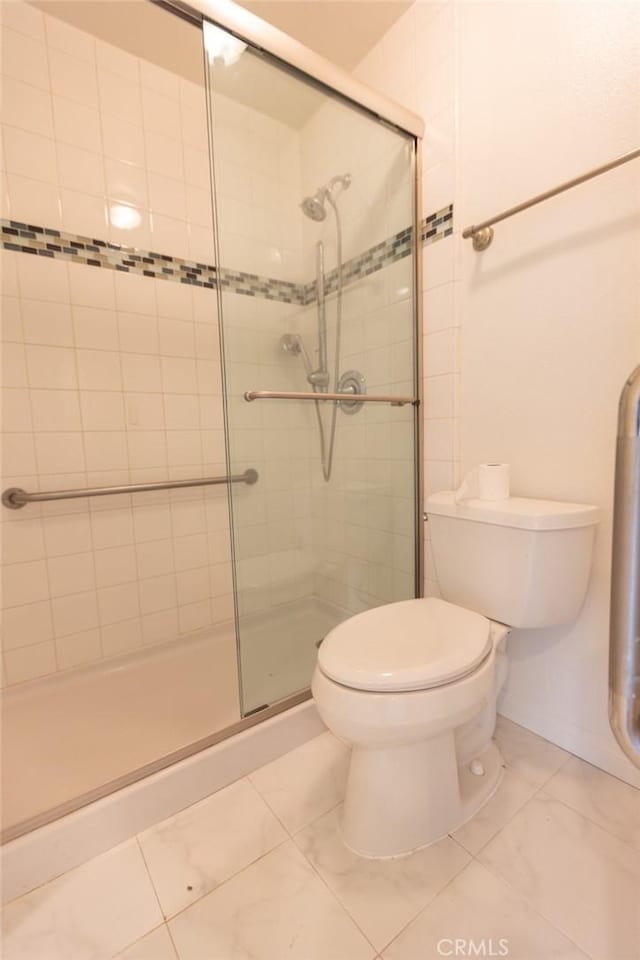 1903 W W Wind, Santa Ana, CA 92704 - bathroom featuring a stall shower and toilet