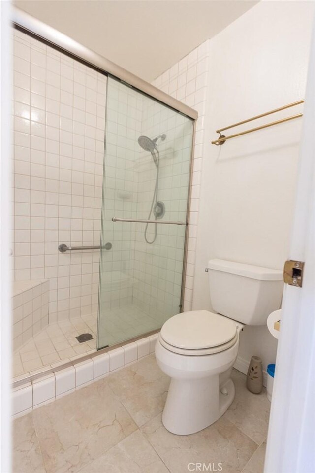 1903 W W Wind, Santa Ana, CA 92704 - full bathroom featuring toilet, a shower stall, and tile patterned flooring