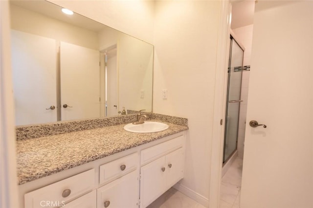 1903 W W Wind, Santa Ana, CA 92704 - full bath with marble finish flooring, vanity, a shower stall, and recessed lighting