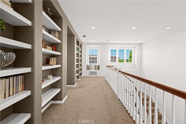 26865 Grey Pl, Stevenson Ranch, CA 91381 - corridor with carpet, recessed lighting, built in features, and baseboards