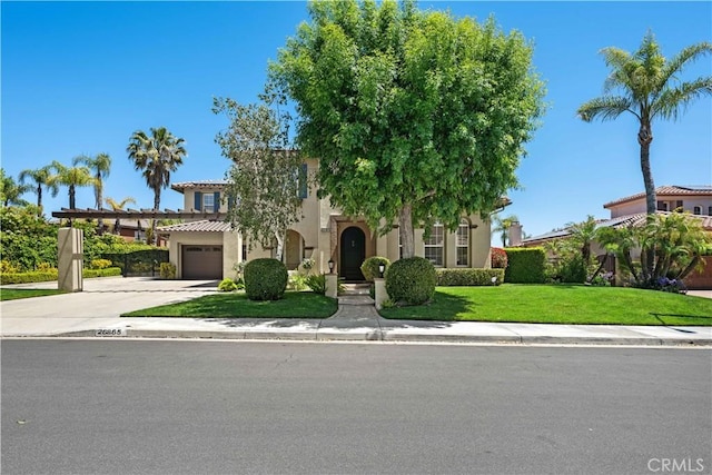 26865 Grey Pl, Stevenson Ranch, CA 91381 - view of front of house with concrete driveway, a garage, a front lawn, stucco siding, and a tile roof