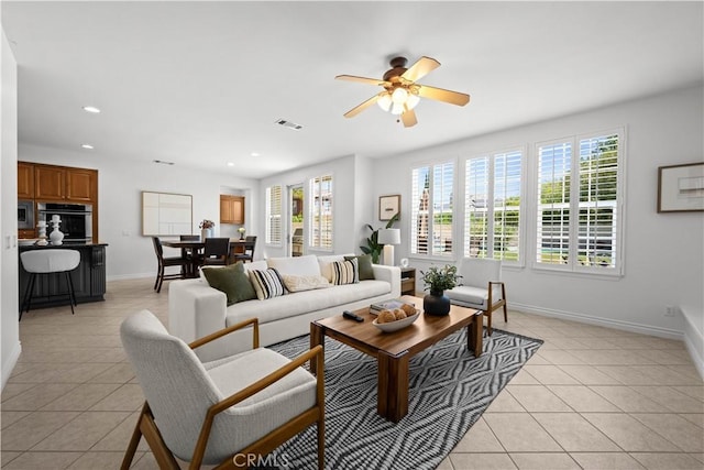 26865 Grey Pl, Stevenson Ranch, CA 91381 - living area featuring light tile patterned floors, baseboards, recessed lighting, and ceiling fan
