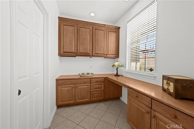 26865 Grey Pl, Stevenson Ranch, CA 91381 - office area featuring built in desk, light tile patterned floors, and recessed lighting
