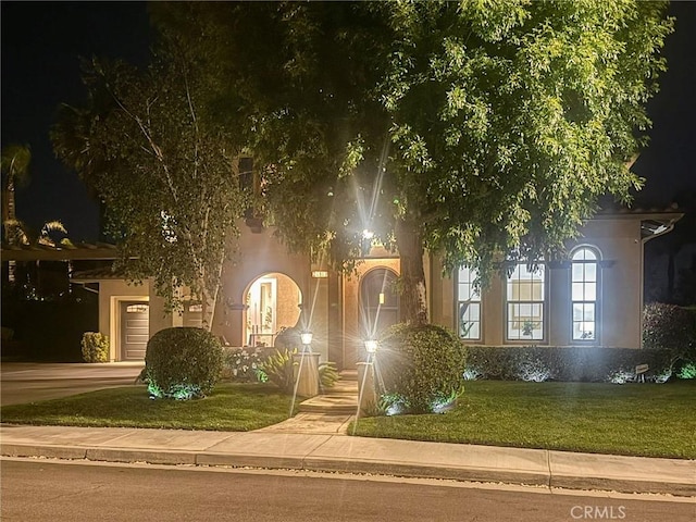 26865 Grey Pl, Stevenson Ranch, CA 91381 - view of property hidden behind natural elements with stucco siding and a yard