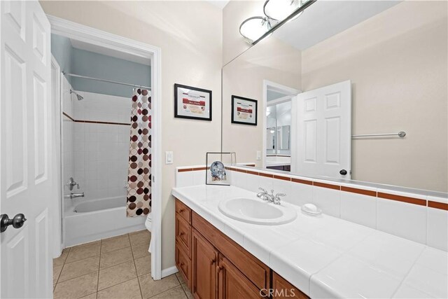 26865 Grey Pl, Stevenson Ranch, CA 91381 - full bath featuring vanity, shower / tub combo, tile patterned flooring, and toilet