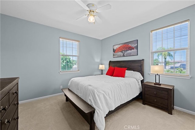 26865 Grey Pl, Stevenson Ranch, CA 91381 - bedroom with light colored carpet, baseboards, and a ceiling fan