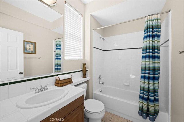 26865 Grey Pl, Stevenson Ranch, CA 91381 - bathroom featuring shower / tub combo with curtain, vanity, toilet, and healthy amount of natural light