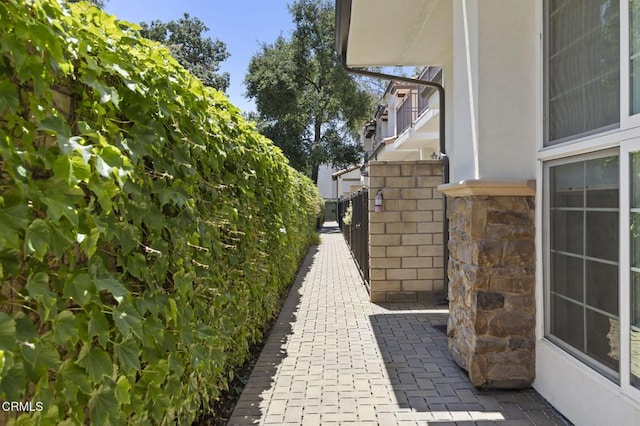 3236 Royal Oaks Dr Unit 5, Thousand Oaks, CA 91362 - view of home's exterior featuring stone siding
