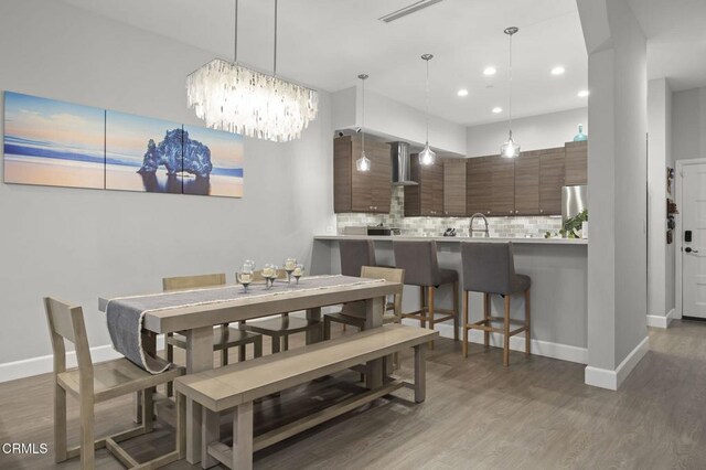 3236 Royal Oaks Dr Unit 5, Thousand Oaks, CA 91362 - dining room with wood finished floors, recessed lighting, and a chandelier