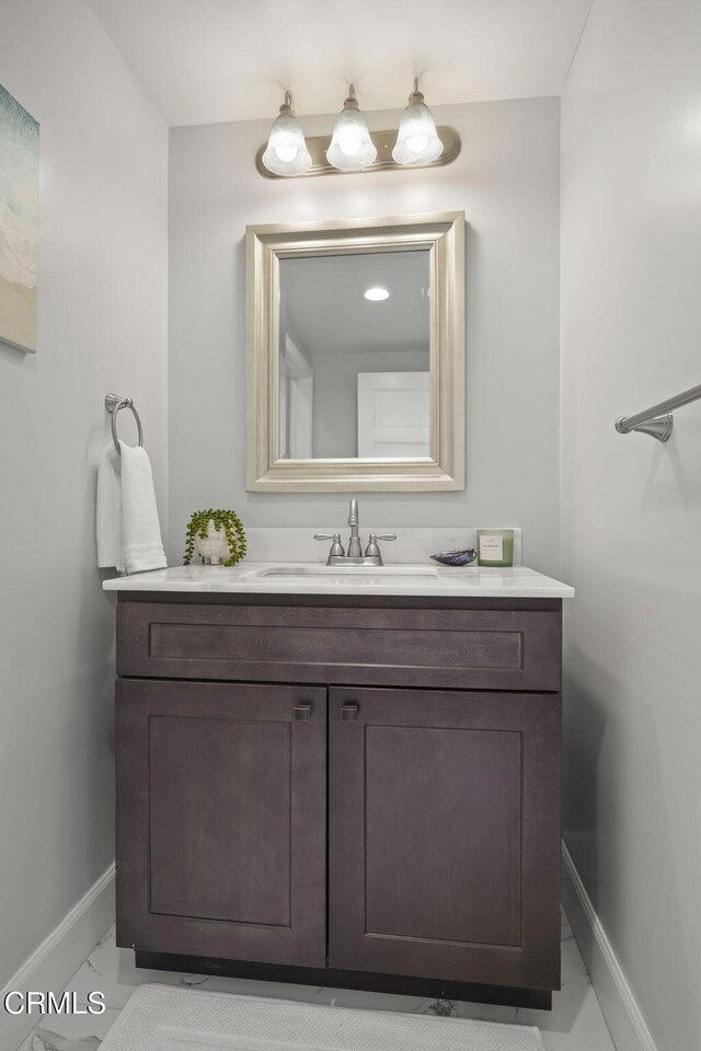 3236 Royal Oaks Dr Unit 5, Thousand Oaks, CA 91362 - bathroom with vanity and marble look tile flooring
