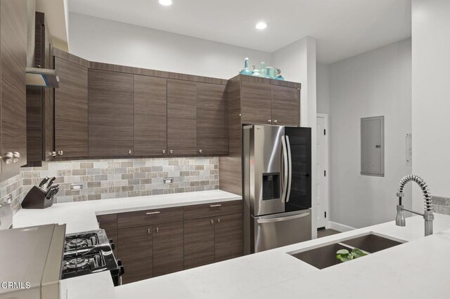 3236 Royal Oaks Dr Unit 5, Thousand Oaks, CA 91362 - kitchen with stainless steel fridge, electric panel, tasteful backsplash, light countertops, and recessed lighting