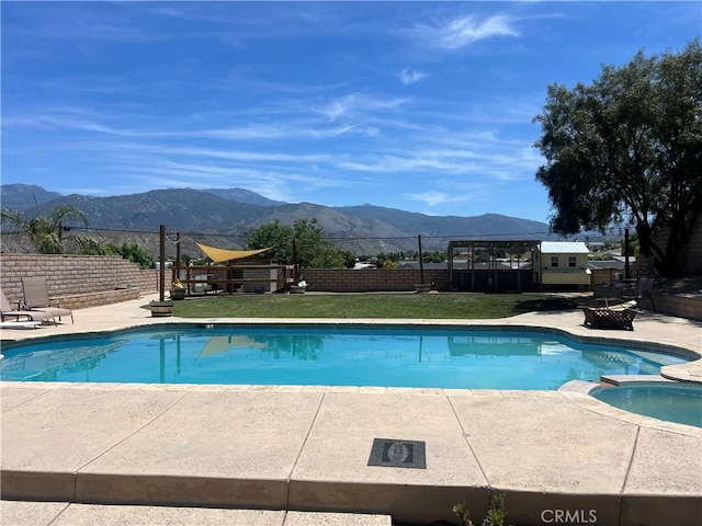 25886 Faircrest Cir, Hemet, CA 92544 - view of swimming pool featuring a fire pit, a mountain view, and a patio area