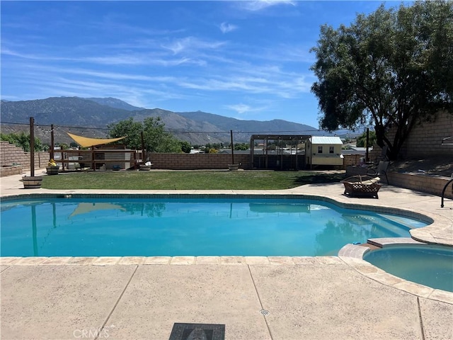 25886 Faircrest Cir, Hemet, CA 92544 - view of swimming pool featuring a fire pit, a mountain view, a patio area, and a pool with connected hot tub