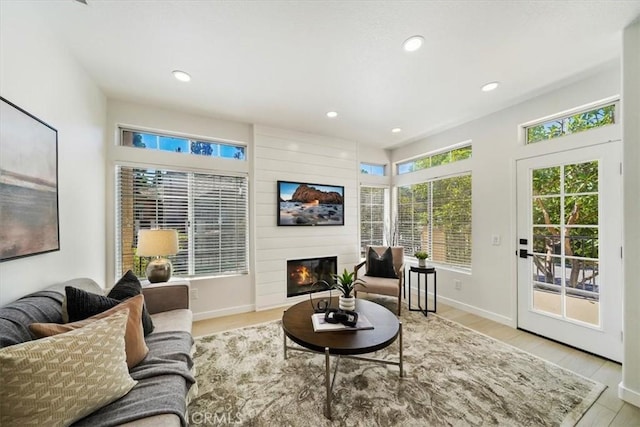 7 Montara Dr, Aliso Viejo, CA 92656 - living area with a large fireplace, recessed lighting, and light wood finished floors