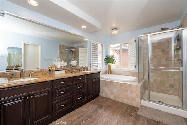 3667 Hawks Dr, Brea, CA 92823 - bathroom featuring a stall shower, double vanity, a garden tub, wood finished floors, and recessed lighting