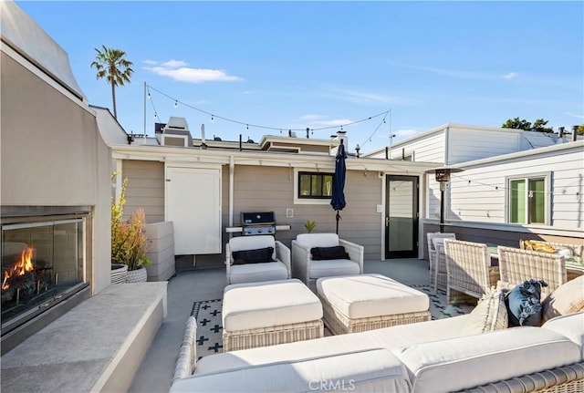 7161/2 Iris Ave, Corona Del Mar, CA 92625 - view of patio with an outdoor living space with a fireplace