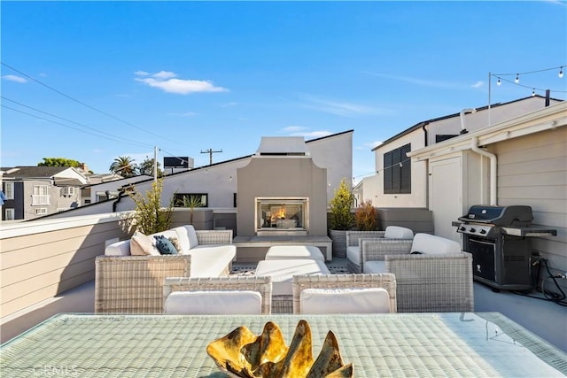 7161/2 Iris Ave, Corona Del Mar, CA 92625 - view of patio / terrace featuring area for grilling and an outdoor living space with a fireplace