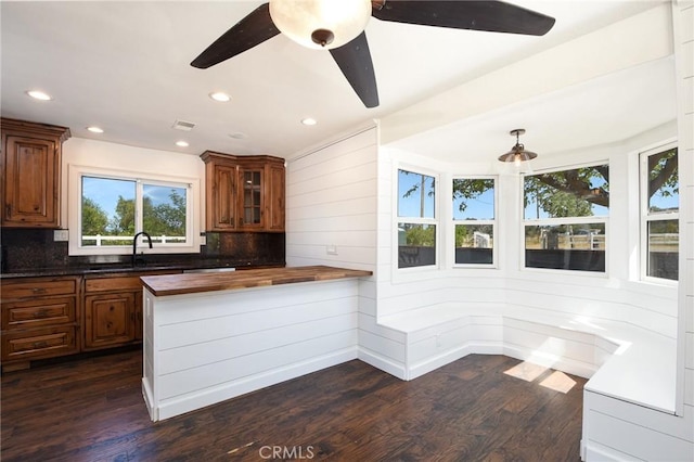 36055 Maddalena Rd, Winchester, CA 92596 - kitchen with a sink, butcher block countertops, brown cabinetry, dark wood-style flooring, and a ceiling fan