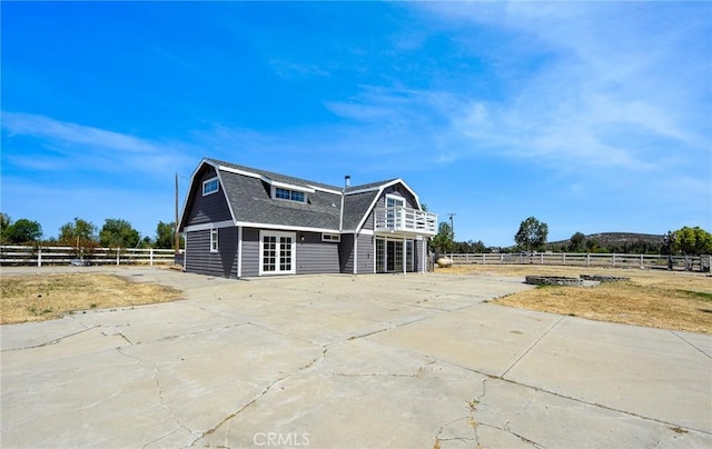 36055 Maddalena Rd, Winchester, CA 92596 - view of front facade featuring a gambrel roof and roof with shingles