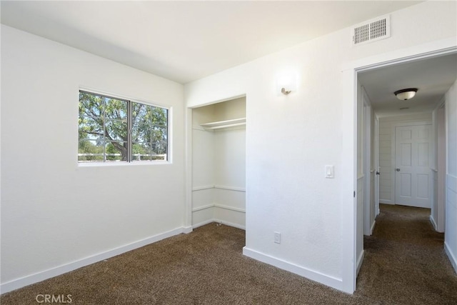 36055 Maddalena Rd, Winchester, CA 92596 - unfurnished bedroom featuring dark colored carpet, a closet, and baseboards