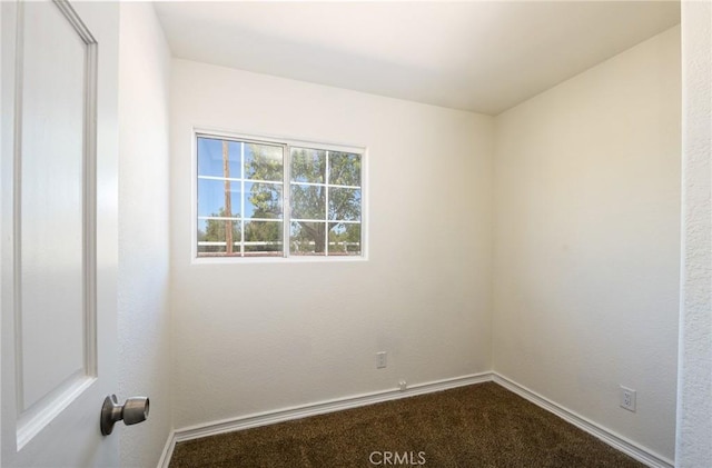 36055 Maddalena Rd, Winchester, CA 92596 - empty room with dark carpet and baseboards