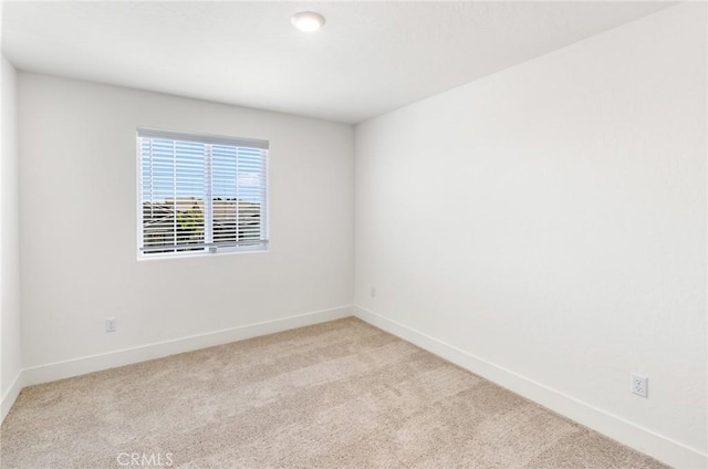 522 Sansoni St, Los Banos, CA 93635 - unfurnished room with light colored carpet and baseboards