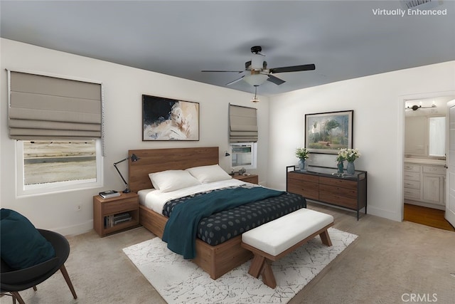 522 Sansoni St, Los Banos, CA 93635 - bedroom with carpet flooring, baseboards, ensuite bathroom, and ceiling fan