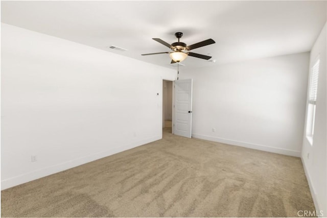 522 Sansoni St, Los Banos, CA 93635 - carpeted spare room featuring ceiling fan and baseboards