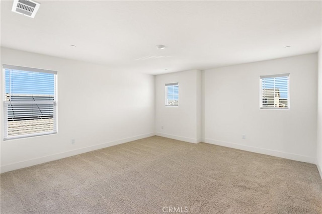 522 Sansoni St, Los Banos, CA 93635 - unfurnished room with light carpet and baseboards