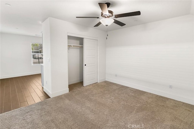 522 Sansoni St, Los Banos, CA 93635 - unfurnished bedroom featuring baseboards, a closet, and a ceiling fan