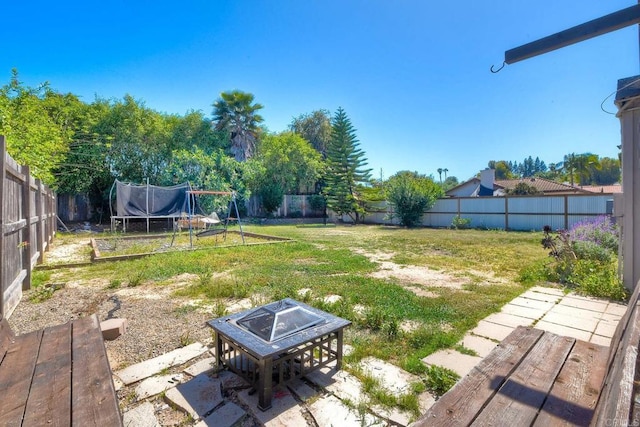 1807 Calle Sinaloa, Vista, CA 92084 - view of yard featuring a trampoline and a patio